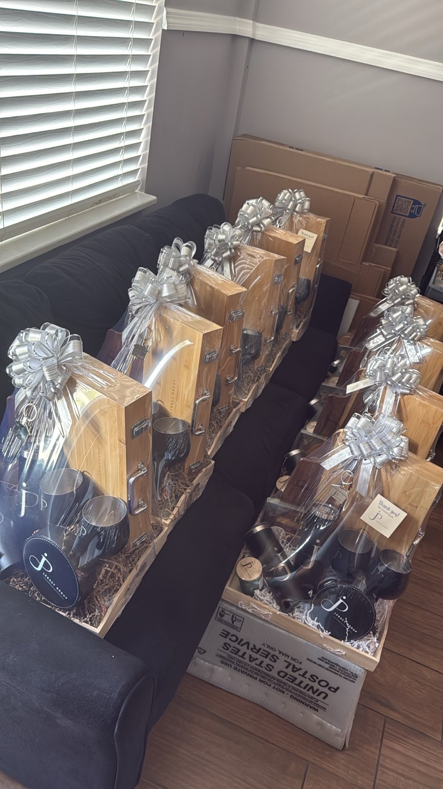 Personalized closing gift baskets wrapped and ready for pickup at the Famgraving studio
