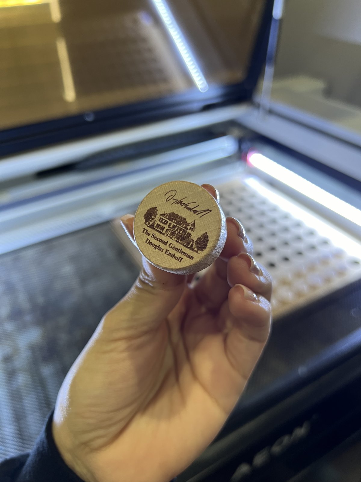 Personalized wooden coaster fresh from the laser in our studio