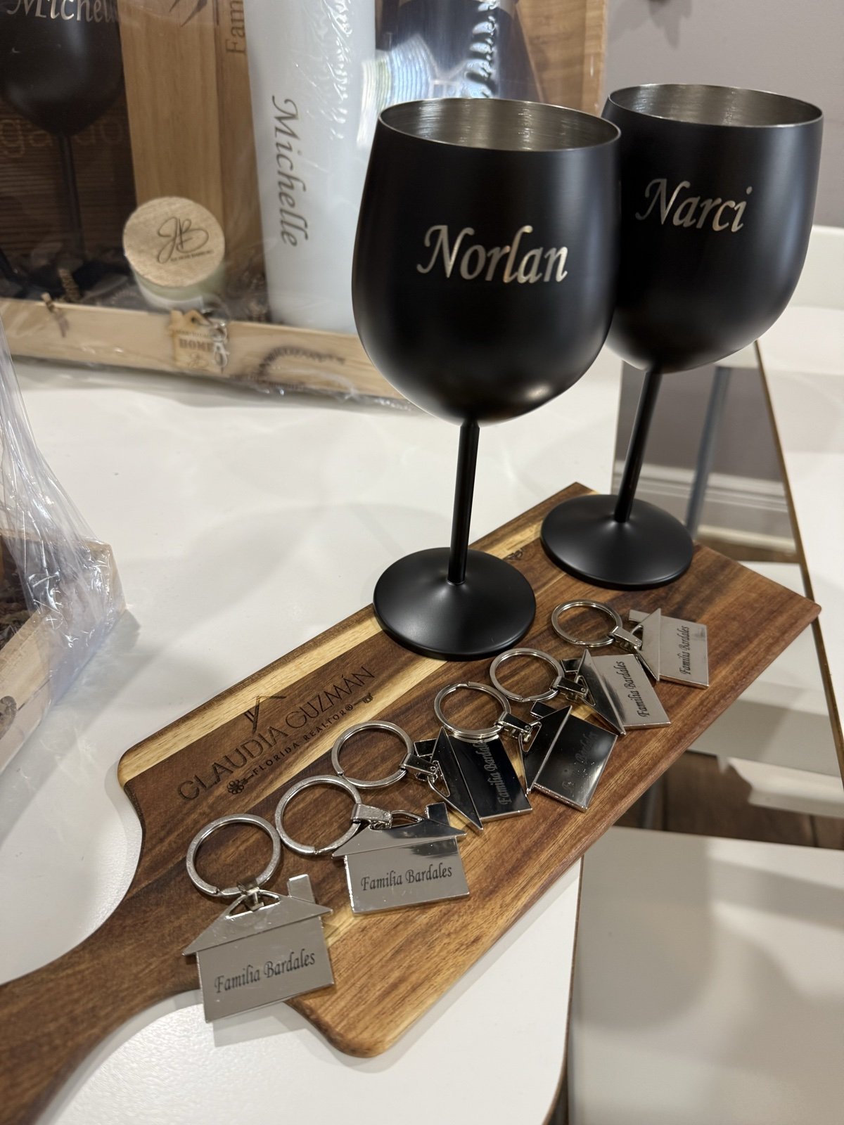 Personalized wine glasses, keychains and serving board