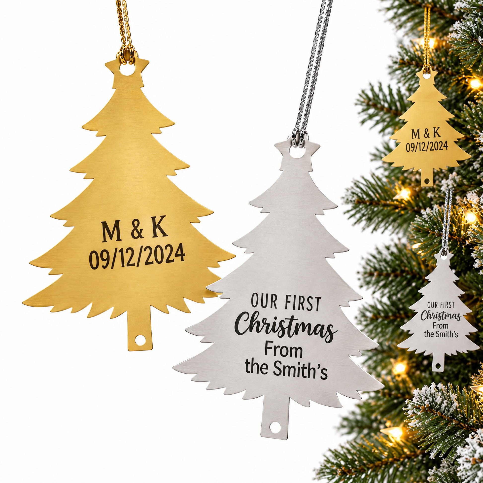 Personalized gold and silver Christmas tree ornaments next to a Christmas tree