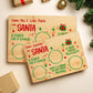 Two personalized Santa cookie trays in bamboo with kids names, small and large